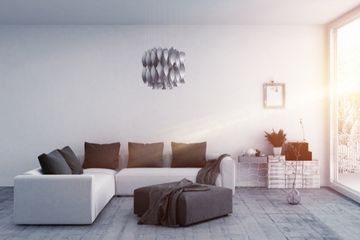 Jak ułożyć koc na narożniku? Jak zaaranżować narożnik w salonie?